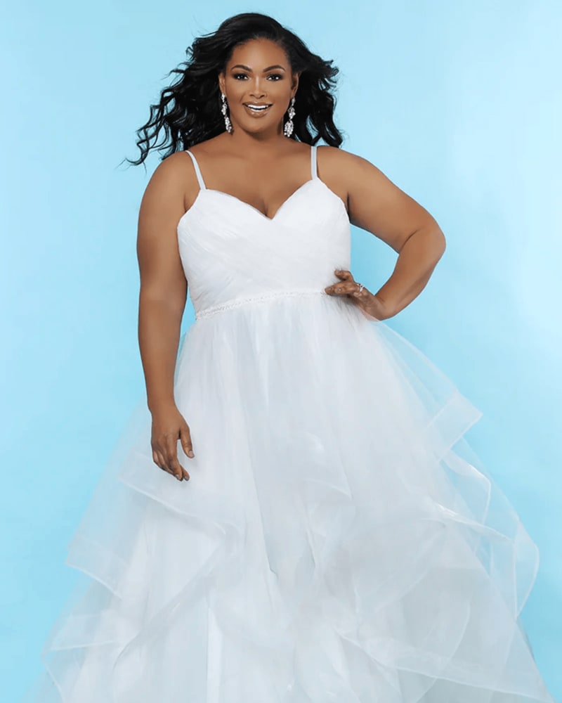 Front of a model wearing a size 26 Ginny Birdal Gown in Ivory by Sydney's Closet. | dia_product_style_image_id:285947